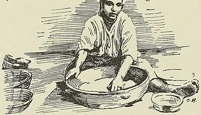 FEMME PRÉPARANT LE COUSCOUSS